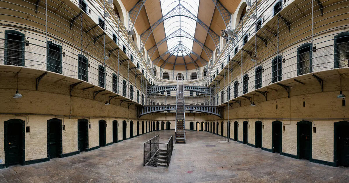 The vaulted Victorian east wing of Kilmainham Gaol under its glass roof