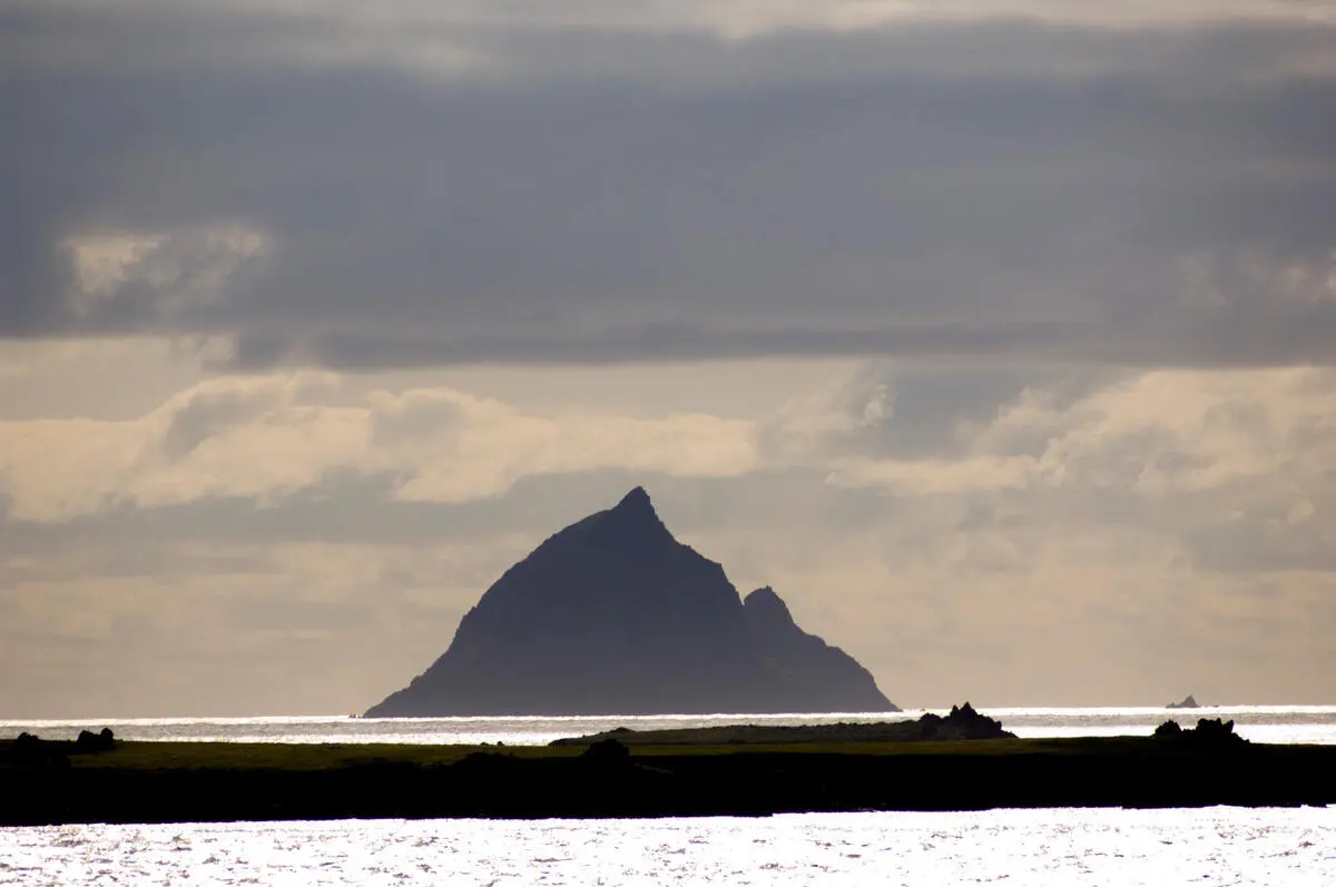 Skellig Michael rising out of the Atlantic off the Kerry coast at dusk
